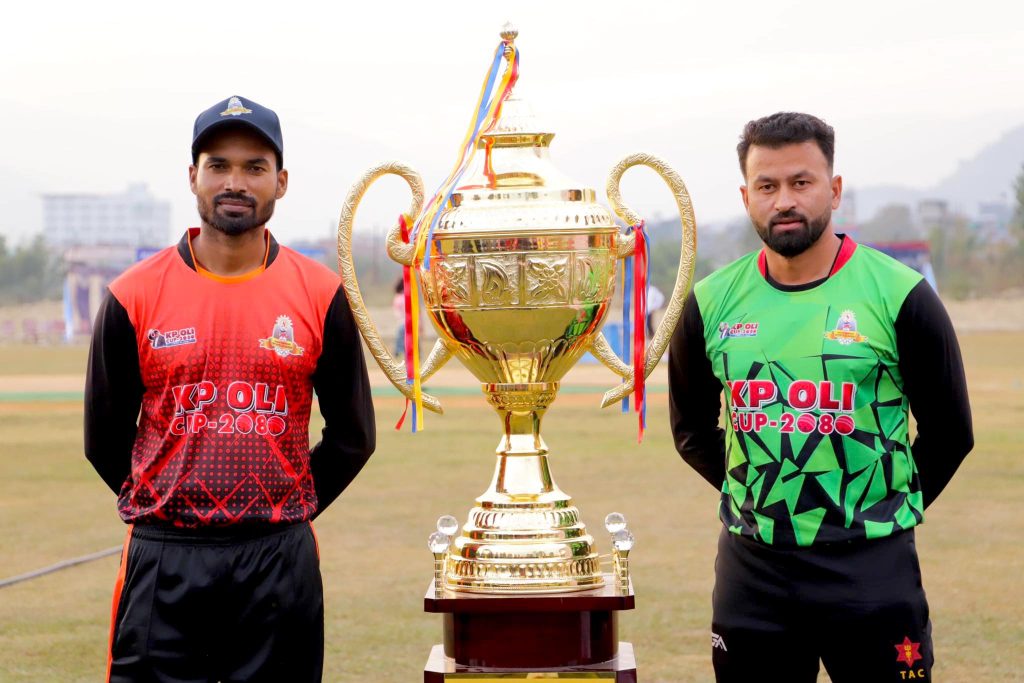 Madhesh Province Captain Hari Shankar Sah & Army Captain Binod Bhandari with the winning trophy of KP Oli Cup