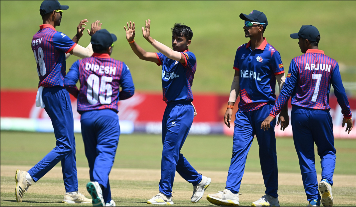 Subash Bhandari of Nepal celebrates the wicket of Luke Watson of New Zealand during the ICC U19 Men's Cricket World Cup South Africa 2024 match between New Zealand and Nepal at Buffalo Park on January 21, 2024 in East London, South Africa.