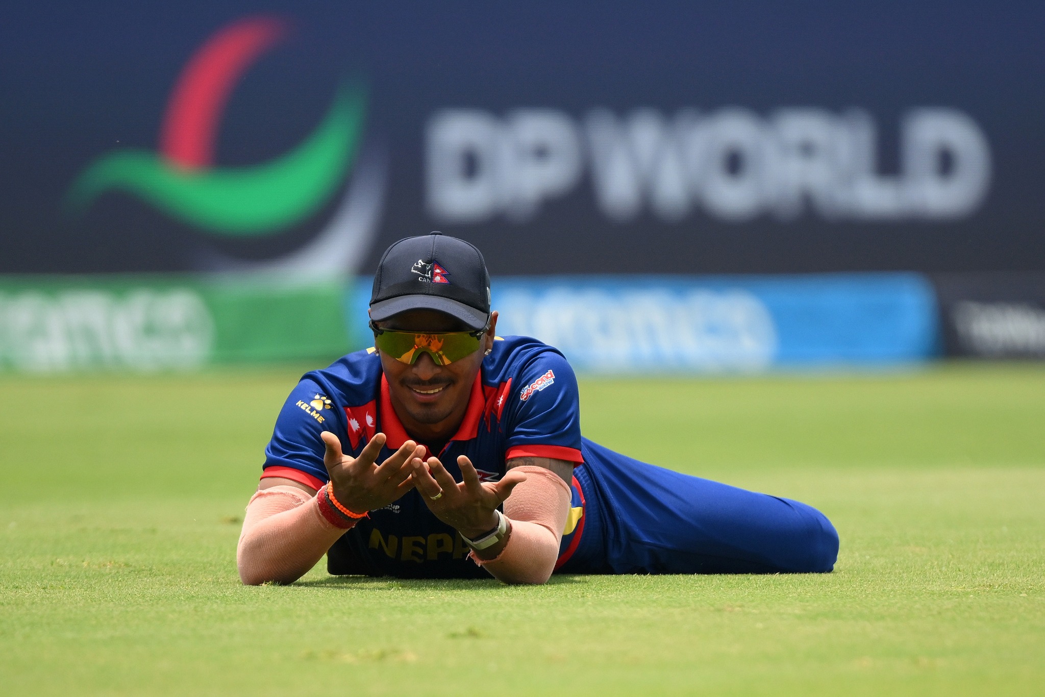 DALLAS, TEXAS - JUNE 04: Sompal Kami of Nepal drops a catch during the ICC Men's T20 Cricket World Cup West Indies & USA 2024 match between Netherlands  and Nepal at  Grand Prairie Cricket Stadium on June 04, 2024 in Dallas, Texas. (Photo by Matt Roberts-ICC/ICC via Getty Images)